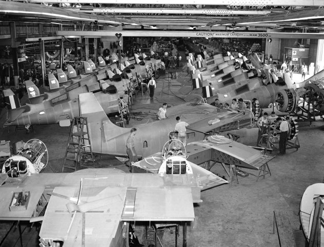 Grumman Wildcats used by the U.S. Marines are shown in production on the assembly line in Bethpage, N.Y., seen Oct. 1942. (AP Photo/Carl Nesensohn)
